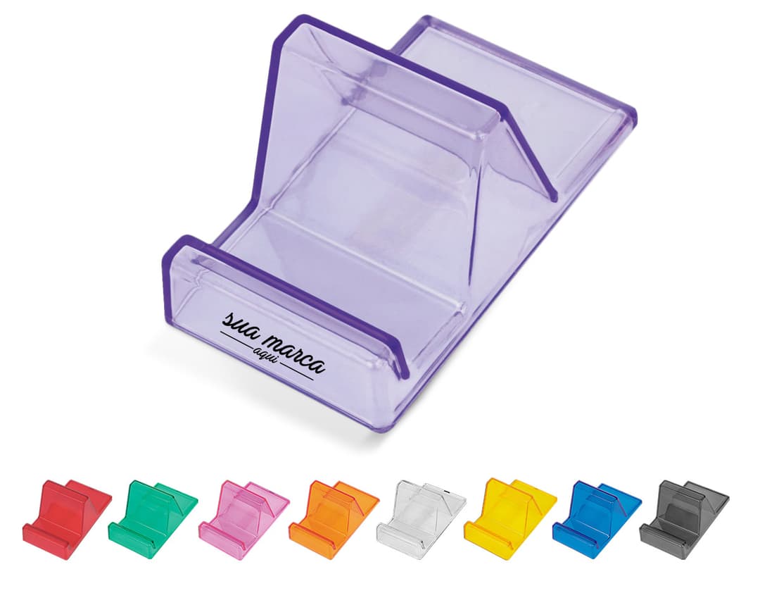 Suporte acrílico para celular em um escritório com computador, notebook, lápis, tela digital e outros equipamentos de escritório.
